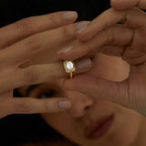 East-West Emerald-Cut Diamond Engagement Ring