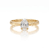 danielle gerber 1 ct natural oval diamond engagement ring with hand-carved textured 14K yellow gold band.