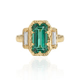 Danielle Gerber One-of-a-kind lagoon tourmaline ring with emerald-cut center, baguette diamonds and hand-carved 14K yellow gold.