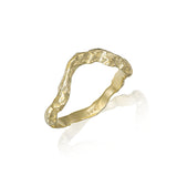 sculptural gold band with raw organic texture