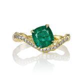 natural emerald and diamond wave ring in 14k gold with organic textured band