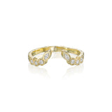 Front view of an open textured gold ring featuring marquise and round bezel-set natural diamonds.