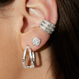 princess cut diamond earrings in 14K oganic textured yellow gold
