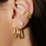 Princess diamond stud earrings with hand-carved organic texture