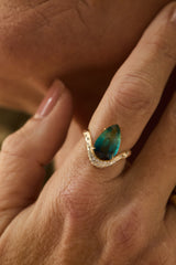 tourmaline wave band ring in 14k gold on hand