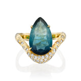 Front view of pear-shaped blue and teal tourmaline ring with diamond halo and organic 14K gold band.