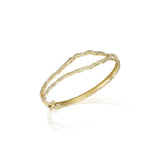 sculptural double wave diamond bracelet yellow gold modern fine jewelry