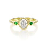 Oval diamond and pear emeralds engagement ring in 14K yellow gold with hand-carved organic texture
