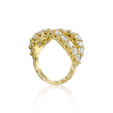Top view of bold Adama diamond ring with round natural diamonds and hand-carved textured gold detailing.