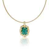 Close-up of 3.3 ct cushion-cut natural emerald surrounded by brilliant-cut diamonds in hand-carved 14K gold on a fine gold choker.