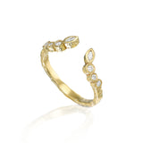 Open 14K gold stackable ring with marquise and round bezel-set natural diamonds in an organic sculptural design.