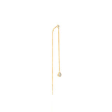 Venus topaz and diamond earring in 14K gold with a polished pear-shaped white topaz drop and delicate chain movement.