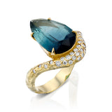 3.3 CT pear-shaped multicolor tourmaline ring with diamond halo and hand-carved 14K gold wave band.